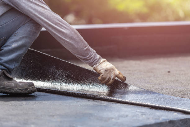 Professional Waterproofing technician working in Bowling Green, OH